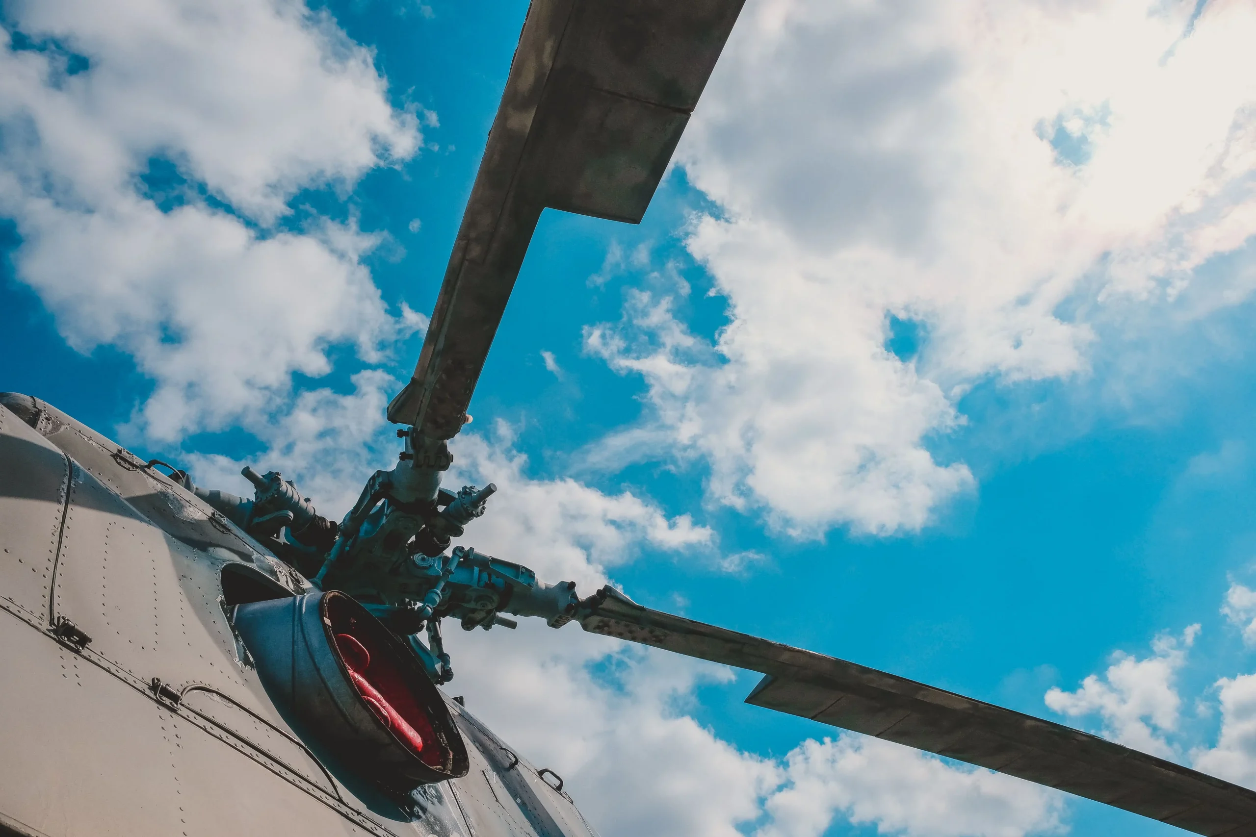 Helicopter rotor blade and hub assembly